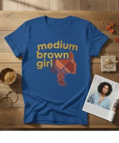 Medium brown girl t-shirt with golden yellow and reddish-brown text and silhouette of a woman's profile