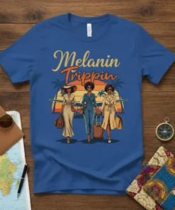 Melanin Trippin' text with three stylish black women walking with luggage at sunset graphic on a blue t-shirt