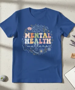 Mental Health Matters text with brain and floral design on a blue t-shirt