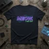 MEOW. I AM CAT text in neon purple and green on a dark t-shirt with circuit board accents