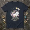 Meowgical Adventures Await text on a navy t-shirt with a cute white cat wearing a unicorn horn and rainbow tail
