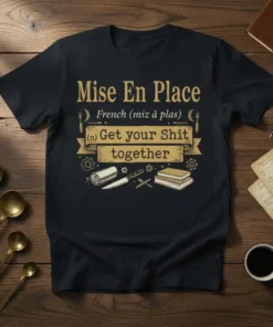 Mise En Place French Get your Shit together quote t-shirt with kitchen tools graphic in gold and white on a