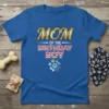 Mom of the Birthday Boy t-shirt with paw prints and bone graphics, featuring gold and red text
