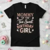 Mommy "Of The" Two Sweet Birthday Girl text with cupcakes and donuts graphic on a black t-shirt