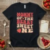 Mommy Of The Berry Sweet One t-shirt with retro font and strawberry graphics