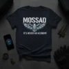 Mossad It's Never An Accident t-shirt design with eagle emblem and distressed text, navy blue shirt