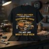 Black t-shirt with yellow text "Most Old Men Would Have Given Up By Now I'm Not Like Most Old Men"