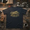 MOTORCYCLE EST. MCMLXX8V vintage motorcycle graphic t-shirt design in gold on a navy blue tee