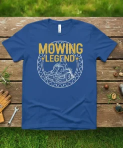 Mowing Legend t-shirt featuring a graphic of a person riding a zero-turn mower within a gear circle