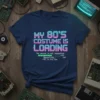 T-shirt with neon text "MY 80'S COSTUME IS LOADING" and retro computer loading bar graphic