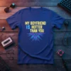 T-shirt with bold yellow and blue text "MY BOYFRIEND IS HOTTER THAN YOU" and a neon circuit graphic