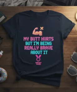 T-shirt with pixelated text "MY BUTT HURTS BUT I'M BEING REALLY BRAVE ABOUT IT" and a pixelated muscle arm graphic