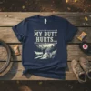 My Butt Hurts T-Shirt featuring a mountain biker on a trail with mountains in the background