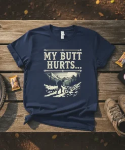 My Butt Hurts T-Shirt featuring a mountain biker on a trail with mountains in the background