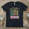 T-shirt with gold and pink text saying "My Daughter turned 21 I NEED A DRINK!" for a 21st birthday celebration