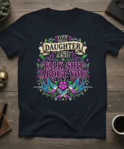 Black t-shirt with bold pink and purple text "My Daughter And Talk Shit About You" surrounded by floral accents and