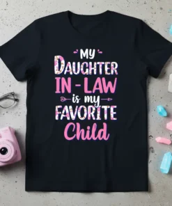My Daughter In-Law is My Favorite Child text design in pink and white floral font on a black t-shirt