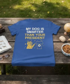 My Dog Is Smarter Than Your President t-shirt design with golden retriever wearing graduation cap and glasses pointing at a