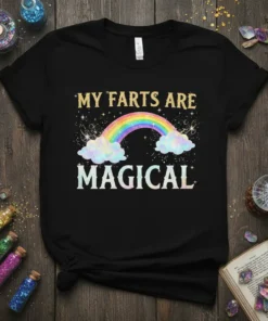 Black t-shirt with "MY FARTS ARE MAGICAL" text above a colorful rainbow and clouds, with glitter accents