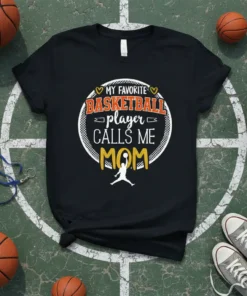 My Favorite Basketball Player Calls Me Mom text design with a basketball player graphic on a black t-shirt