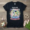 My Favorite Bunnies Call Me Grandma text with cute bunnies and rainbow graphic on a black t-shirt