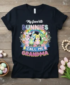 My Favorite Bunnies Call Me Grandma text with cute bunnies and rainbow graphic on a black t-shirt