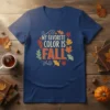 My Favorite Color Is Fall text with autumn leaves graphic on a navy blue t-shirt