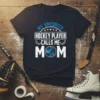 My Favorite Hockey Player Calls Me Mom text design with hockey puck graphic on navy t-shirt
