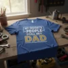 My Favorite People Call Me Dad text design with gear graphics on a blue t-shirt, perfect for Father's Day gifts