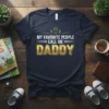 Navy t-shirt with gold and white text "My Favorite People Call Me Daddy" and a crown graphic