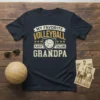 Navy t-shirt with "My Favorite Volleyball Player Calls Me Grandpa" text and volleyball graphic