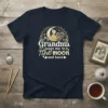 T-shirt with text "my Grandma loves me to the moon and back" featuring a crescent moon, a heart, and a