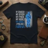 My Grandson My Officer My Pride Nana Police T-Shirt with text and blue polygonal police officer graphic on a black