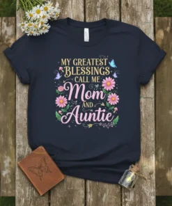 T-shirt with text "My Greatest Blessings Call Me Mom And Auntie" featuring floral and butterfly graphics