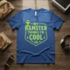My Hamster Thinks I'm Cool text with cartoon hamster graphic on a blue t-shirt