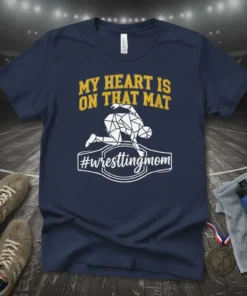 Navy t-shirt with yellow text "MY HEART IS ON THAT MAT" and a white geometric wrestling graphic with "#wrestlingmom" below