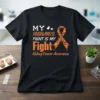 Black t-shirt with orange and white text: My Husband's Fight Is My Fight Kidney Cancer Awareness, featuring a ribbon made