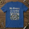 My Knees Are Certified Refurbished quote with mechanical knee graphic and "APPROVED" stamp on a blue t-shirt