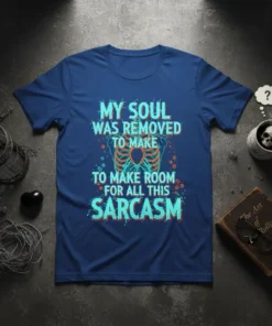 Blue t-shirt with "My Soul Was Removed To Make Room For All This Sarcastic" text in distressed turquoise and orange