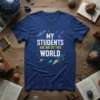 My Students Are Out Of This World quote on a navy blue t-shirt with space graphics like planets and rockets