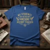 Gold text "My Students Have An Awesome Awesome History Teacher" on a royal blue t-shirt, featuring scroll and quill graphics