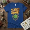 My Warts Are Finally Gone! quote with a green succulent in a decorative frame on a royal blue t-shirt