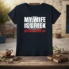 My Wife Is Greek Nothing Scares Me text design on a dark t-shirt with distressed graphic elements