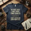 Navy t-shirt with "MY WIFE SAYS I ONLY HAVE TWO FAULTS I DON'T LISTEN AND SOMETHING ELSE." quote in distressed