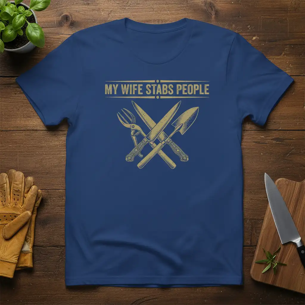 My Wife Stabs People quote with gardening tools graphic on a navy blue t-shirt