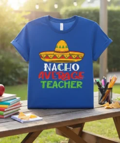 Blue t-shirt with "Nacho Average Teacher" text and a sombrero graphic, perfect for educators