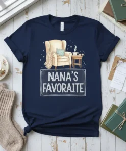 Nana's Favorite graphic t-shirt design with a cozy armchair, blanket, and teacup, featuring "Nana's Favorite" text