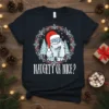 Naughty Or Nice? Christmas Yeti T-Shirt with Santa hat and festive wreath design