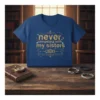Never competing with my sisters quote in gold ornate font on a blue t-shirt