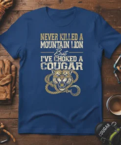 NEVER KILLED A MOUNTAIN LION But I'VE CHOKED A COUGAR text with a cougar graphic and rope on a blue